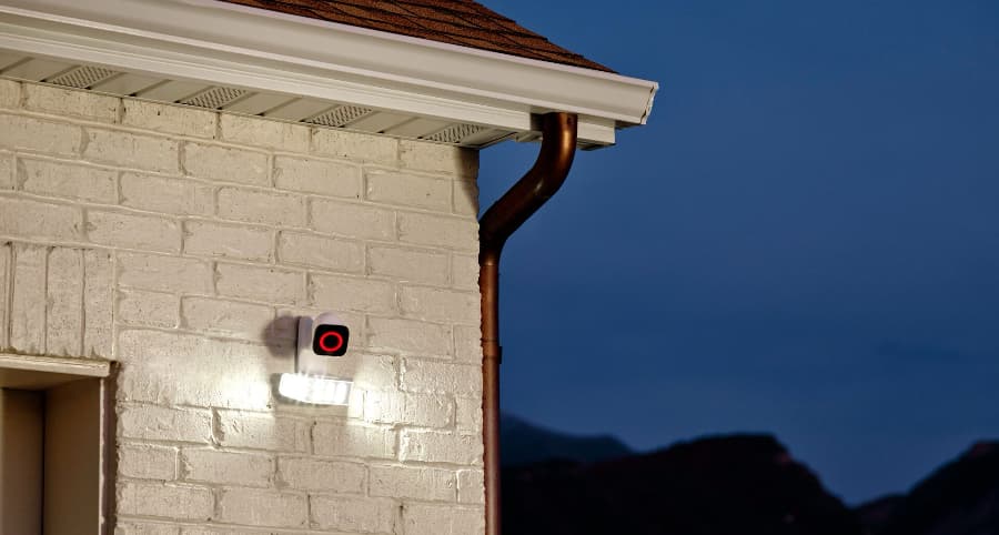 Vivint Spotlight Pro outdoor camera seen beside a garage